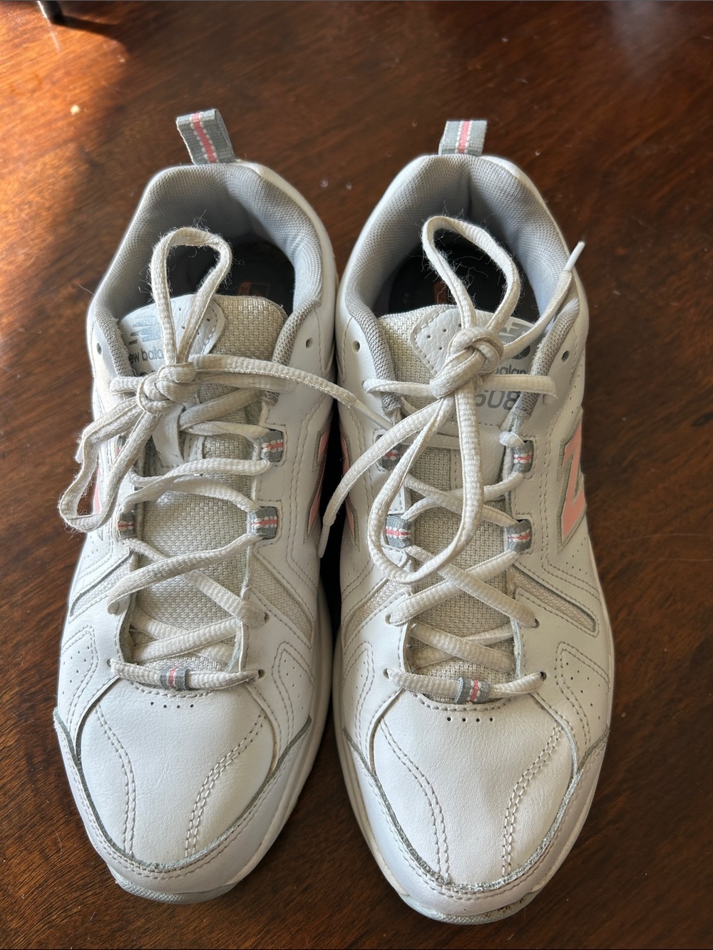 New Balance White Sneakers with Pink Accent Detailing